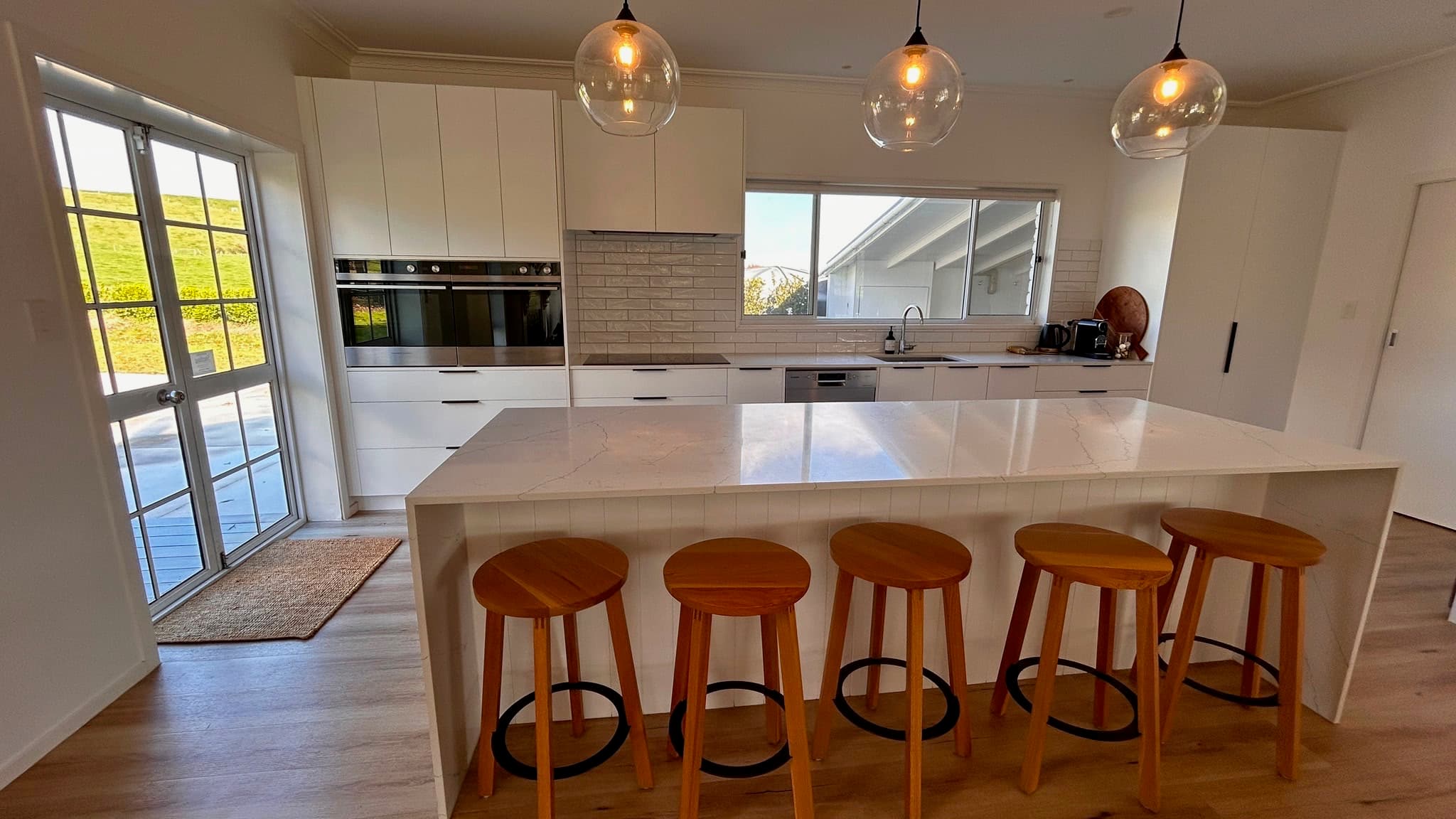 Large island kitchen with breakfast stools